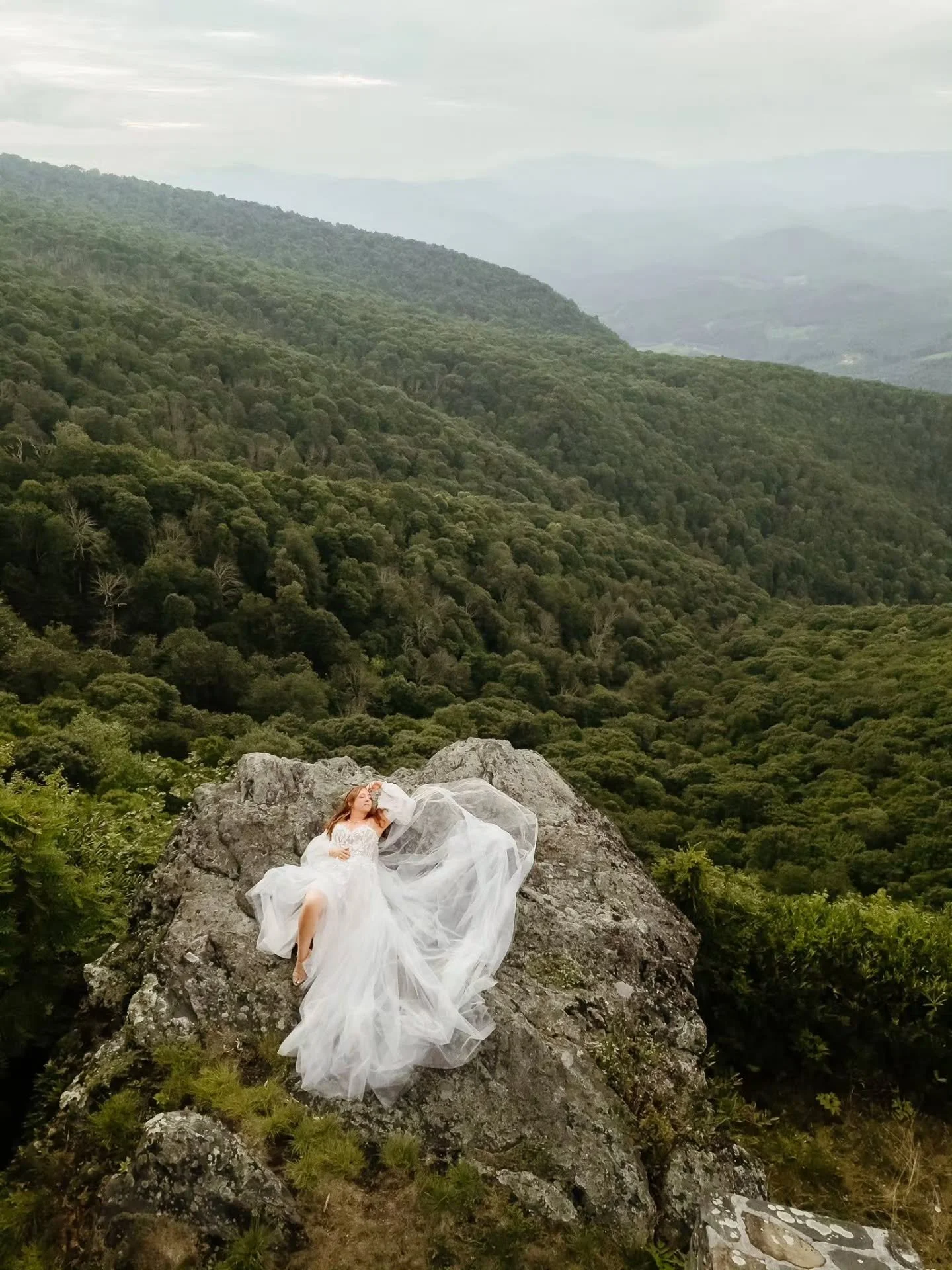 Congratulations to Emily + Mike 🍾

I seriously can't get over those Blue Ridge views or that dress! 😍 It was such a beautiful reminder that you don't need a huge wedding to have an unforgettable one.
Emily &amp; Michael, thank you for letting me be