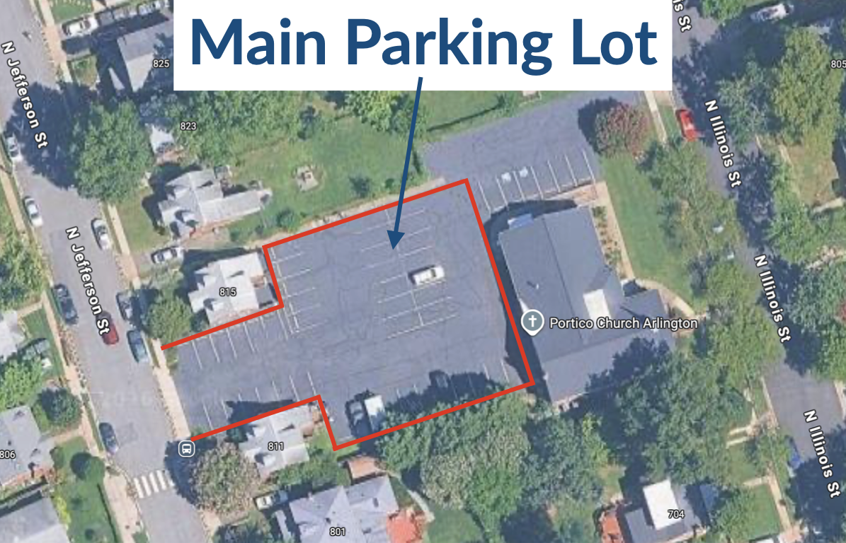 A satellite map showing a parking lot called Main Parking Lot, outlined in red, with marked parking spaces and several parked cars. The lot is adjacent to Portico Church Arlington. Streets surrounding the lot include N Jefferson St and N Illinois St.