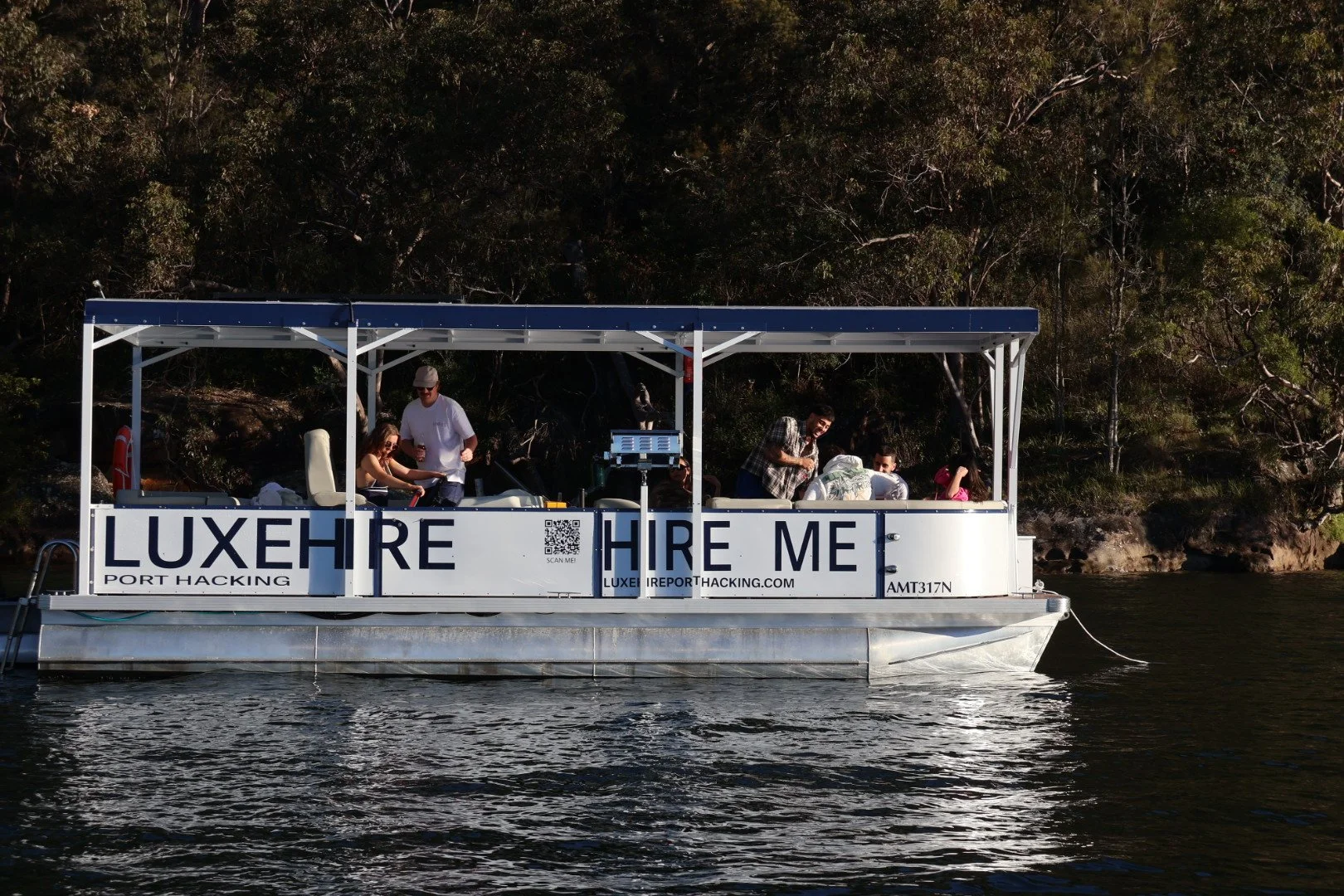 Luxe Hire self-drive boat on Port Hacking with guests enjoying a private boat hire experience.