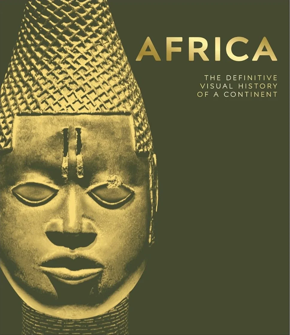 Book cover titled 'Africa: The Definitive Visual History of a Continent' with an African mask illustration on a dark green background.