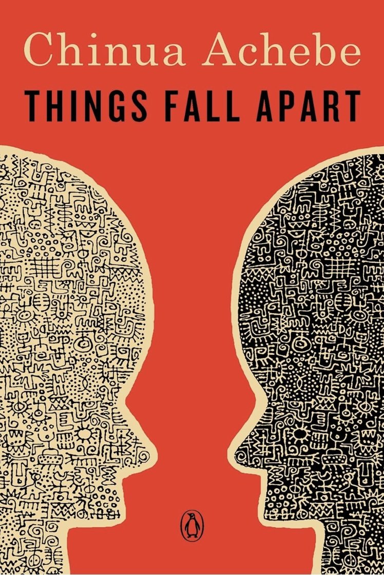 Book cover for 'Things Fall Apart' by Chinua Achebe. The cover features two stylized human profiles with intricate black and beige patterns facing each other against a red background.