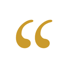 Gold quotation marks on a black background.