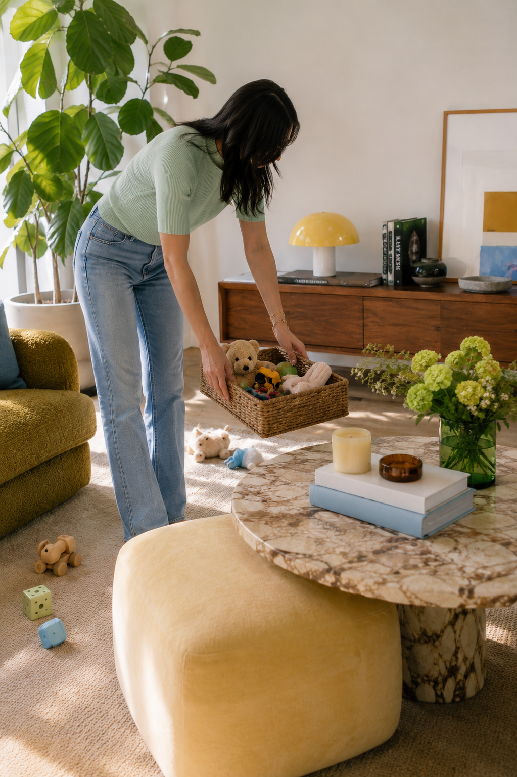 tend header image mothers helper agency 2026 helping tidy up toys in modern eclectic neutral living room