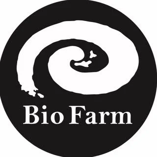 Bio Farm logo with a black and white spiral snake design and the text 'Bio Farm' underneath.
