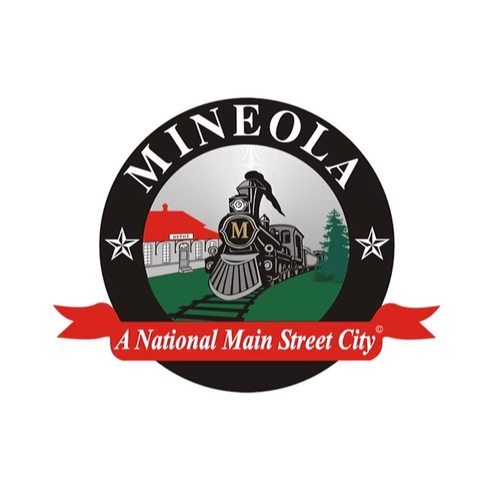 Logo of Mineola, featuring a train, a school building, trees, and a red ribbon with text, "A National Main Street City."