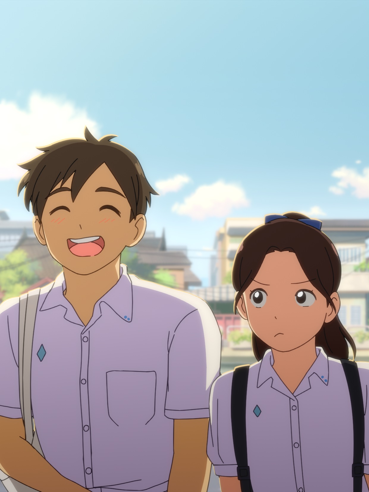 Two school children in uniform walking outdoors in a sunny neighborhood with houses and trees, one smiling happily and the other looking somewhat upset or worried.