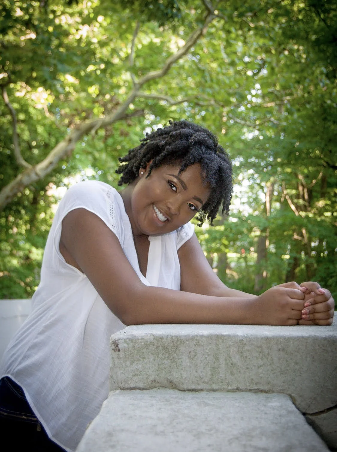 Alona Shardae smiling outdoors
