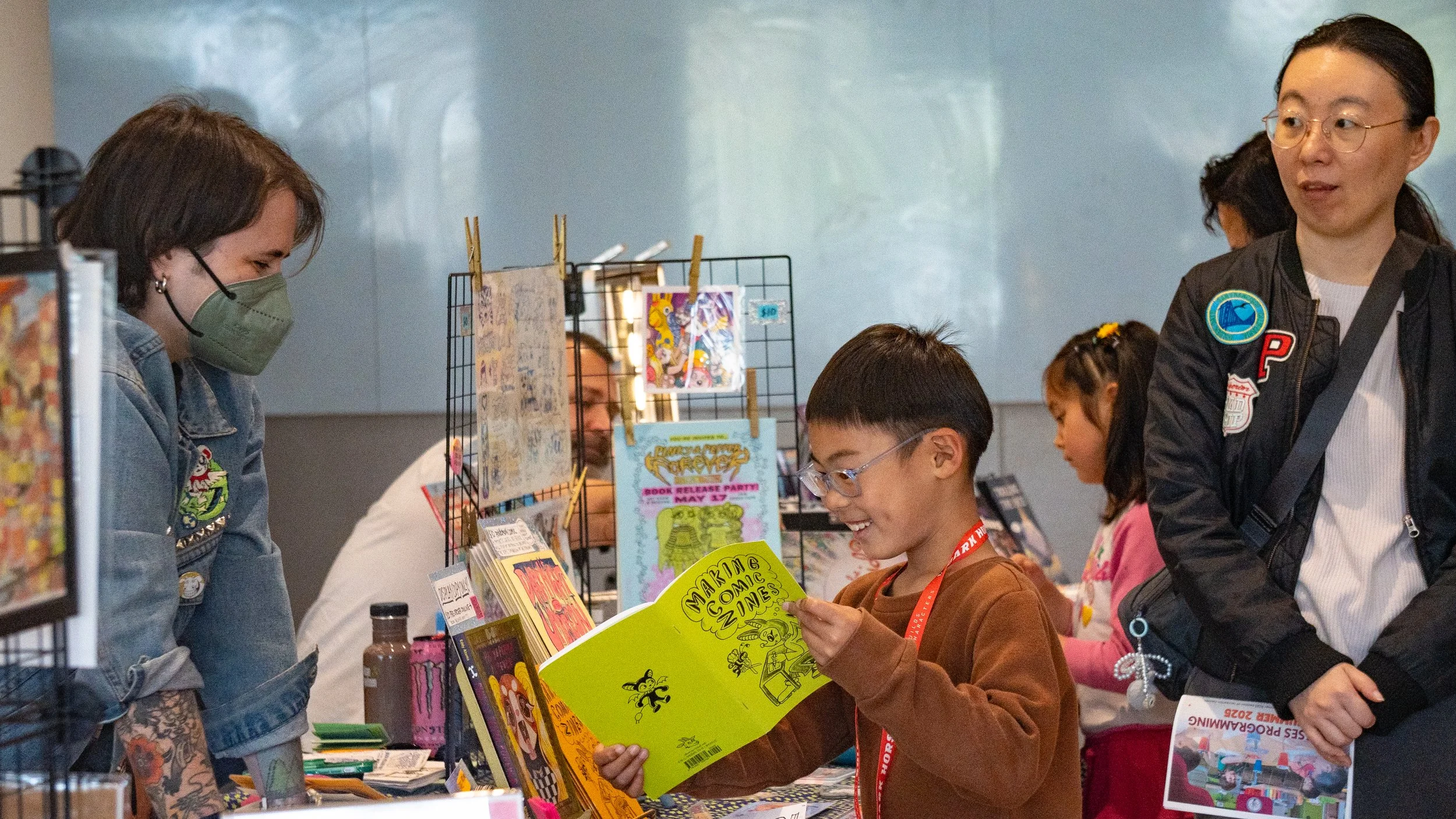 Joanna Yang and Brendan Chen from San Bruno regularly visit libraries to borrow books. On Saturday, Chen found delight in browsing new reads sold by independent artists for the 2025 Peninsula Libraries Comic Arts Fest’s Small Press Comics Expo.