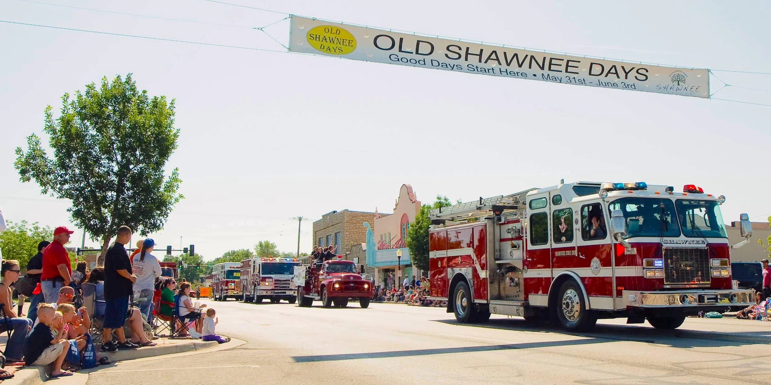 A fire engine and other vehicles in the Old Shawnee Days parade