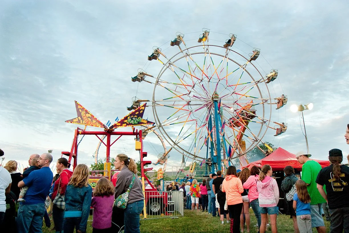 Old Shawnee Days Carnival rides and crowd