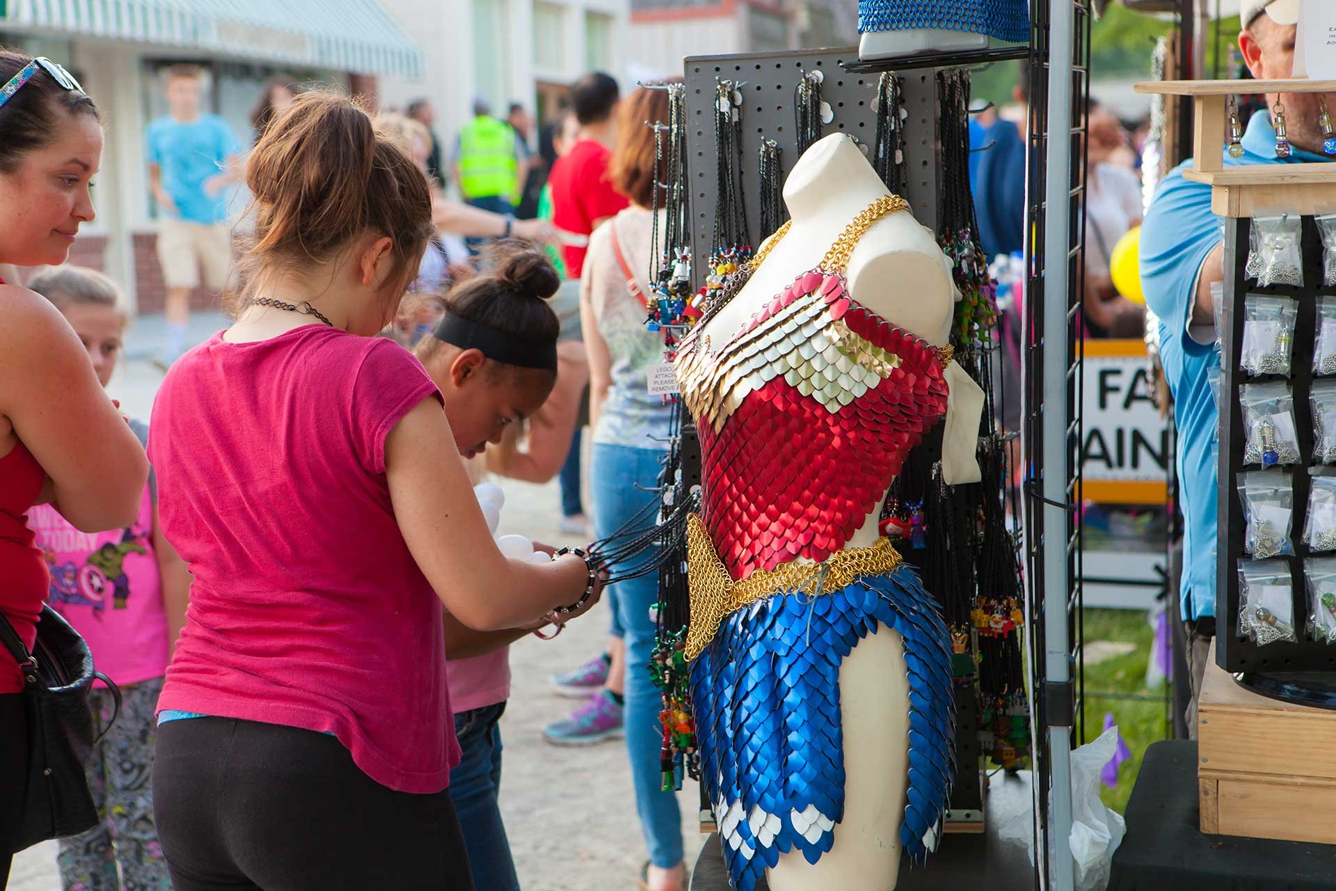 woman browsing in a vendor booth