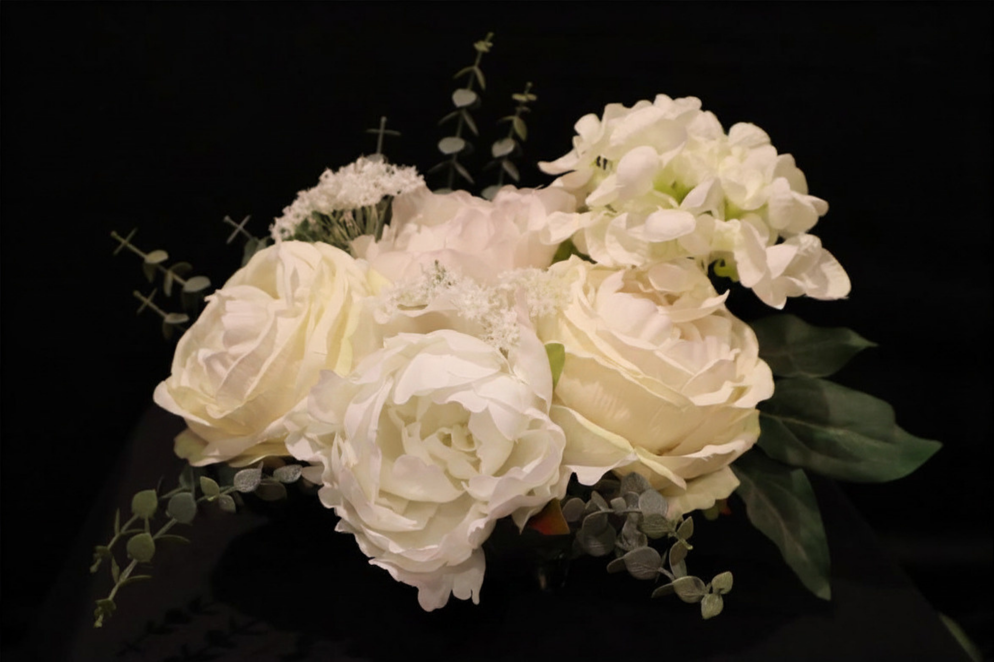 white flowers with black background