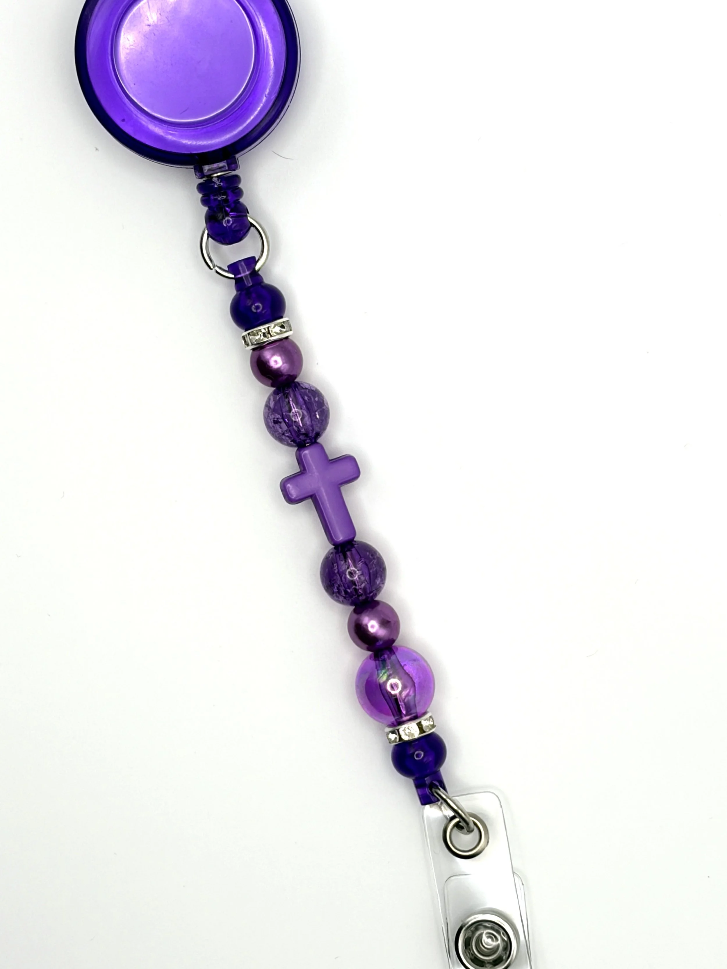 Cross Badge Reels