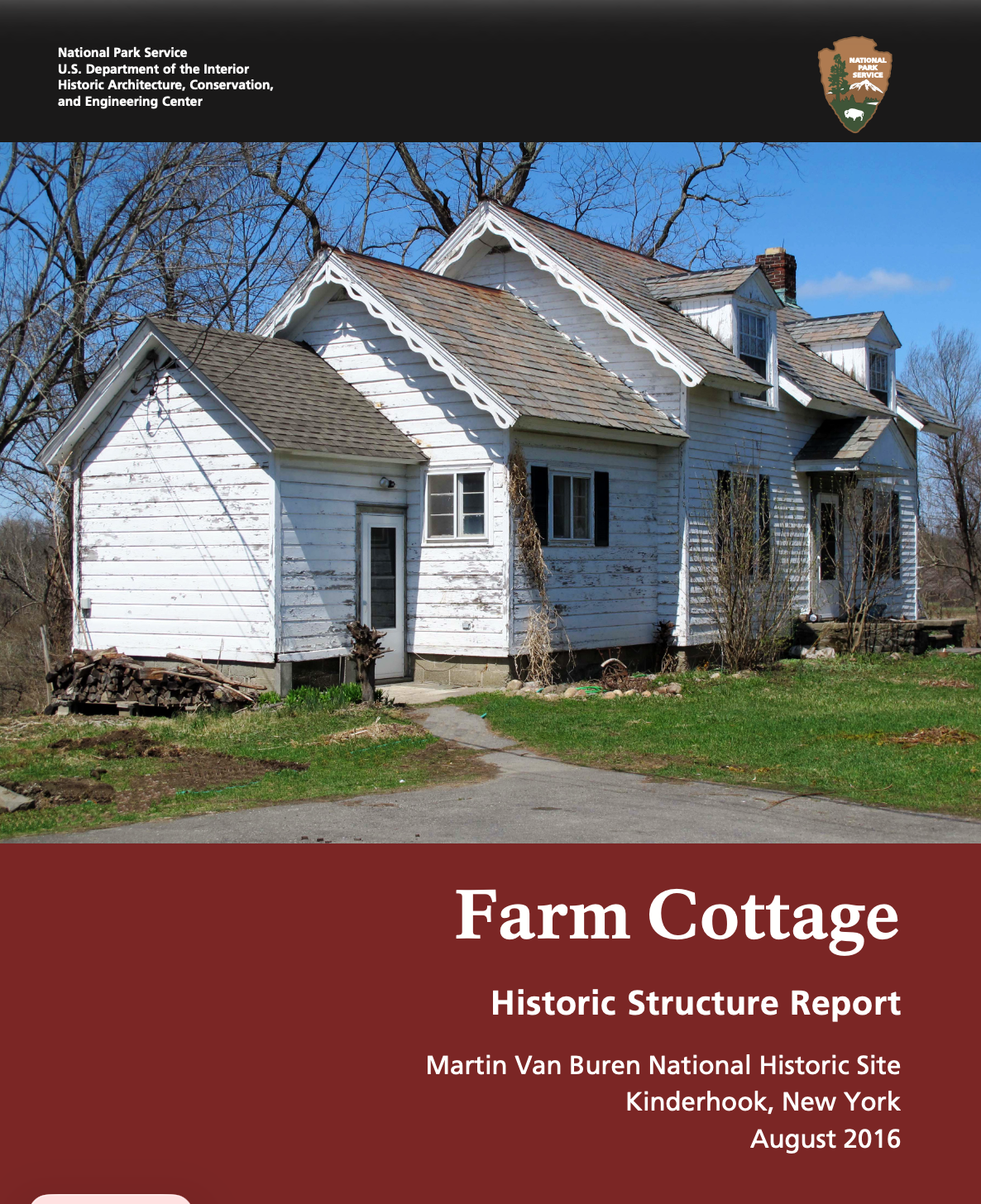 Cover of a historic structure report titled 'Farm Cottage', featuring a white, weathered, two-story farmhouse with decorative trim, surrounded by a grassy yard and leafless trees against a bright blue sky.