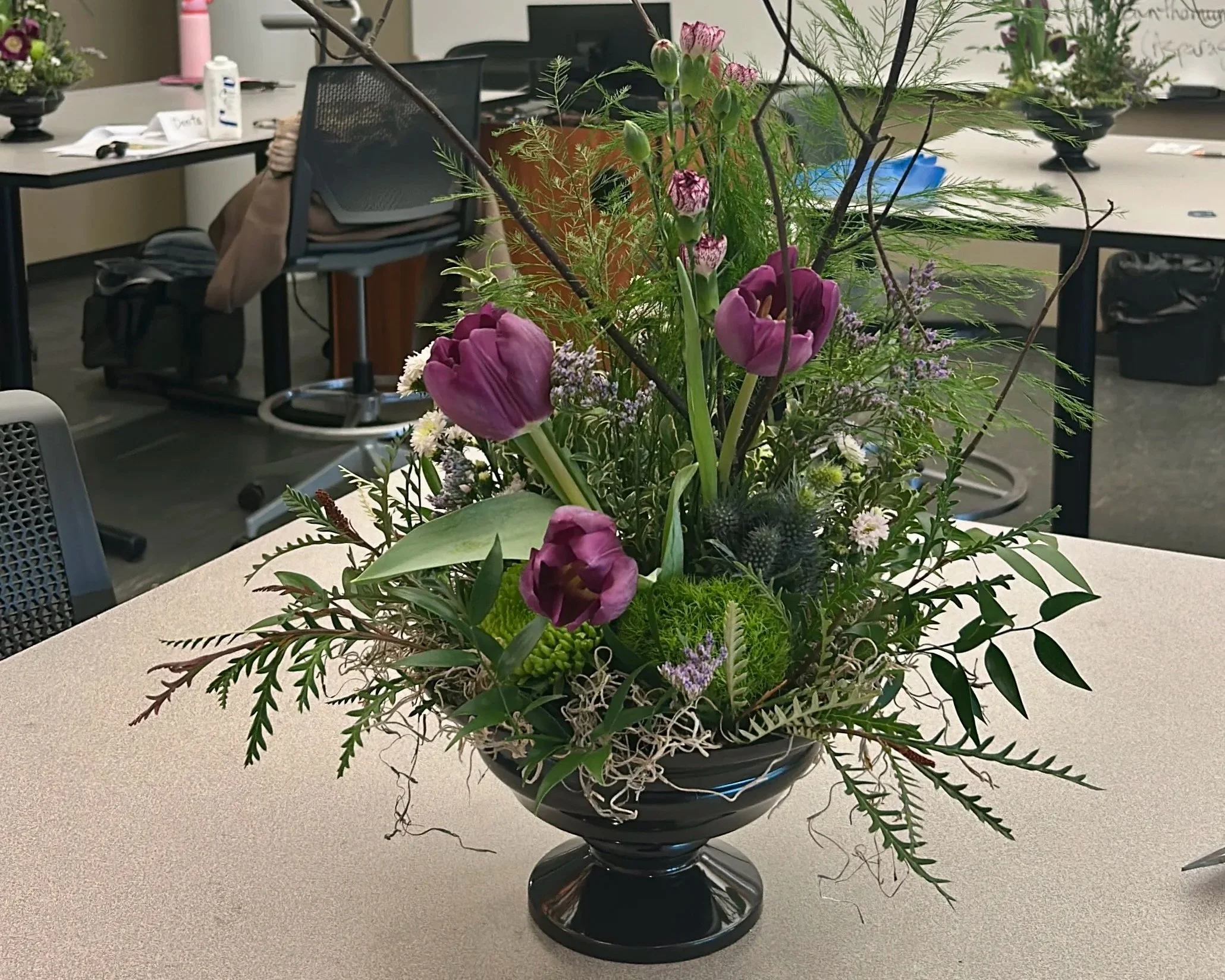 Purple tulip arrangement made in a Mount Royal floral design class.
