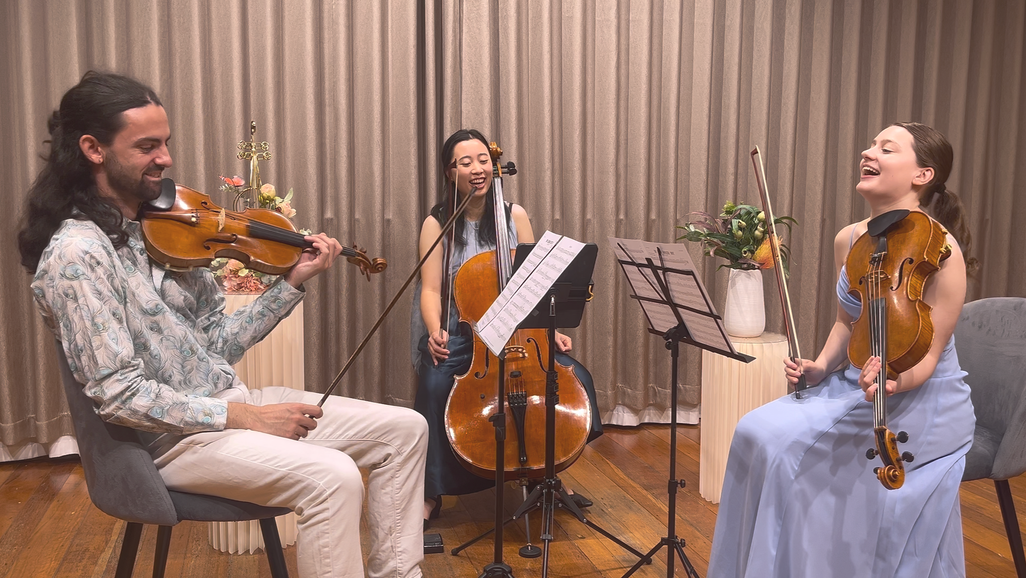 A string trio playing pop music in Sydney