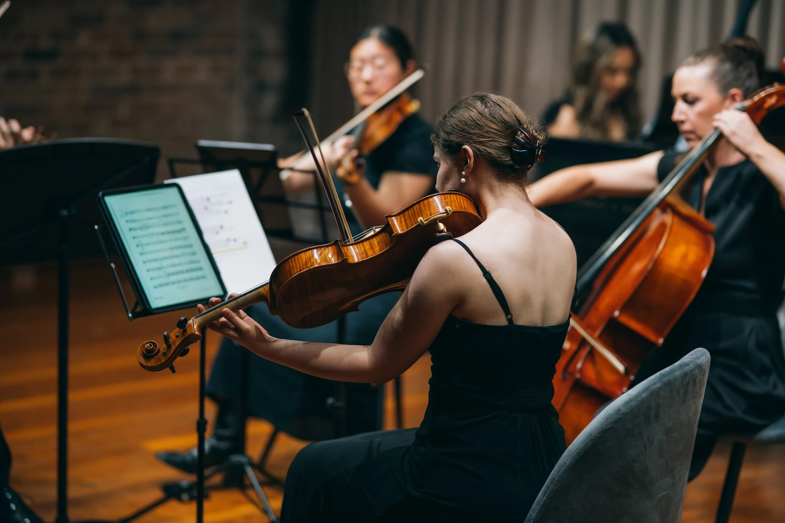 Sydney string quartet and pianist performing wedding music at a showcase in Sydney