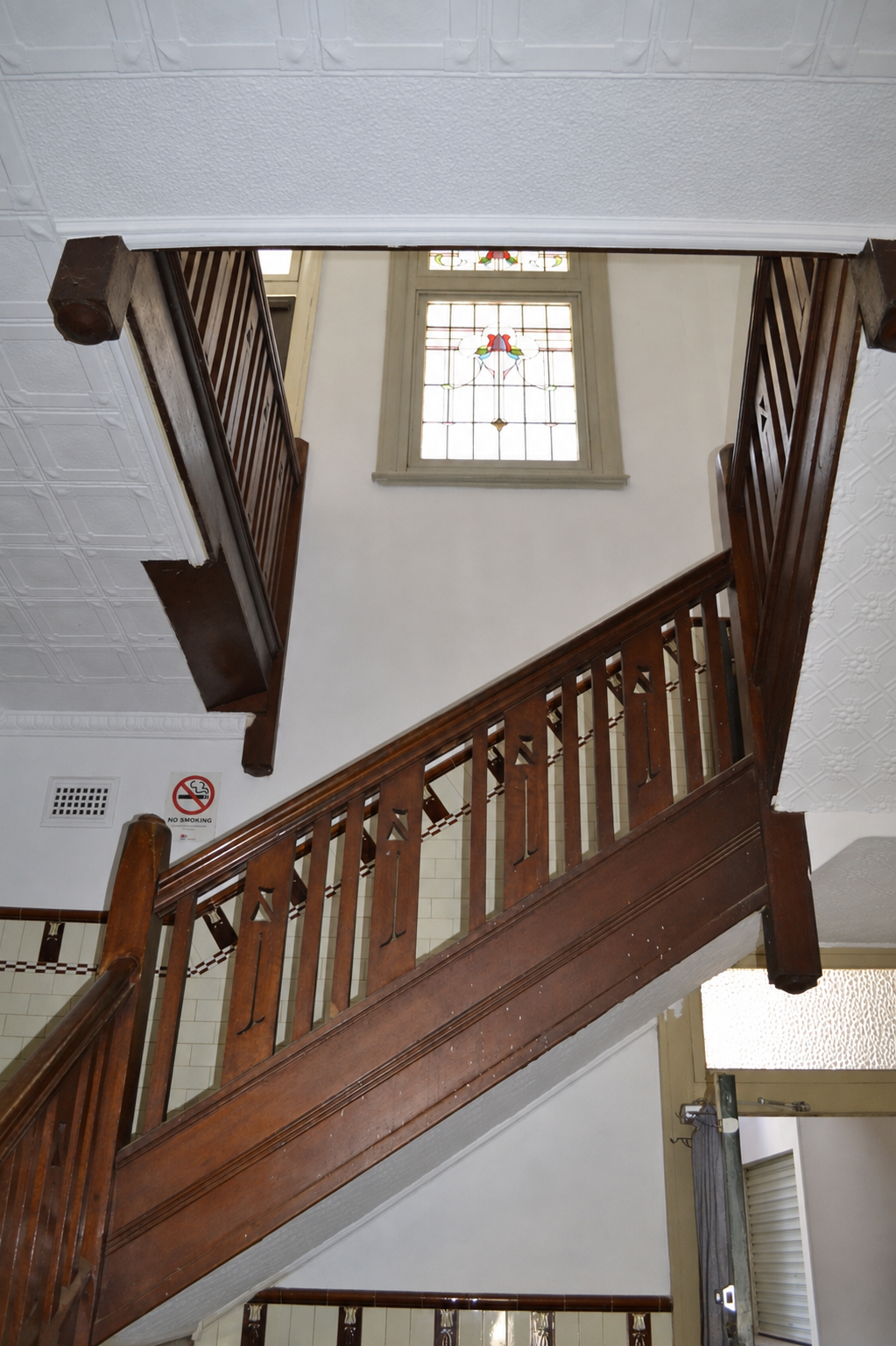 Ornate Staircase Beneath Stained Glass window at the Barellan Commercial Hotel