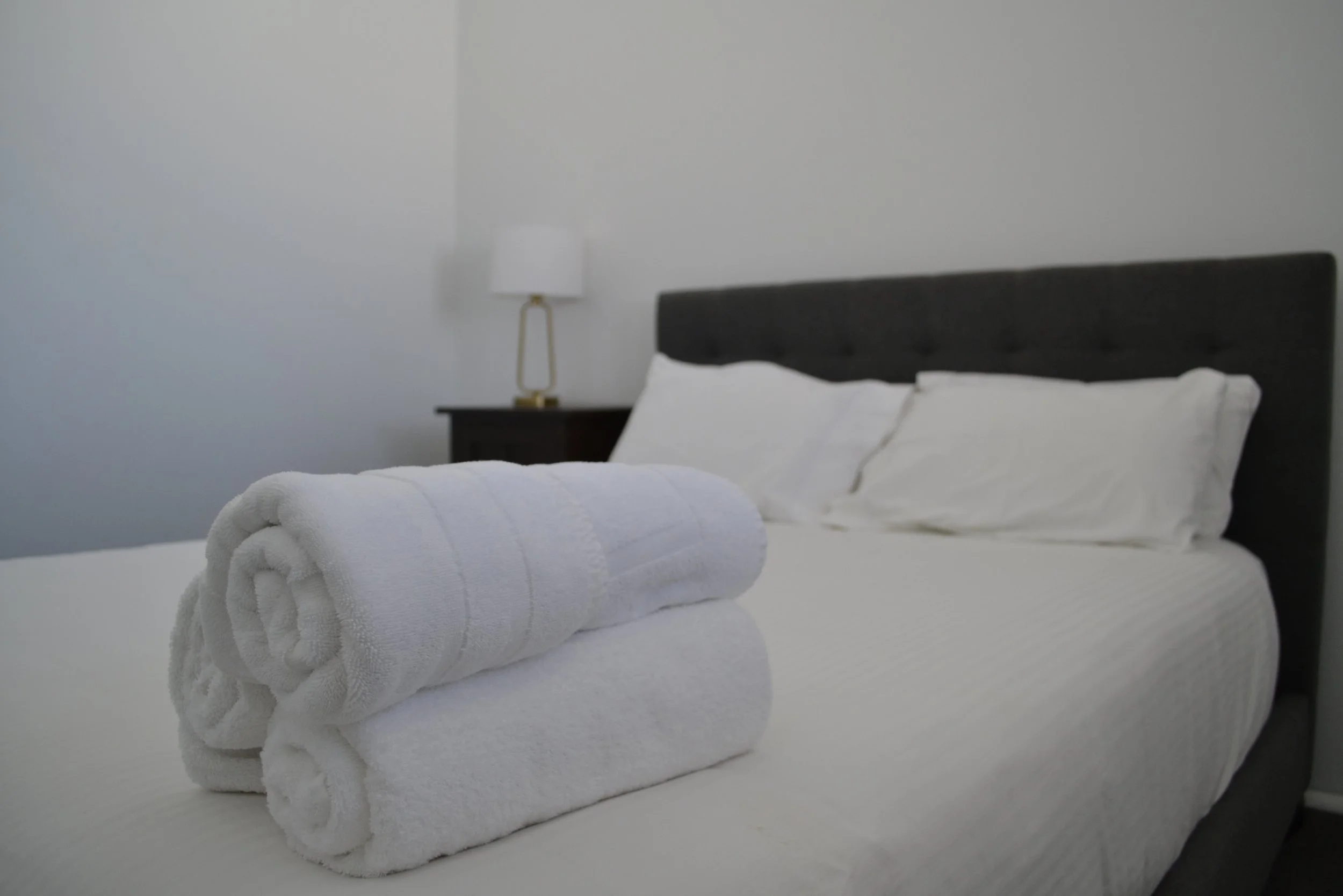 Double room with crisp clean white sheets at the Barellan commercial hotel
