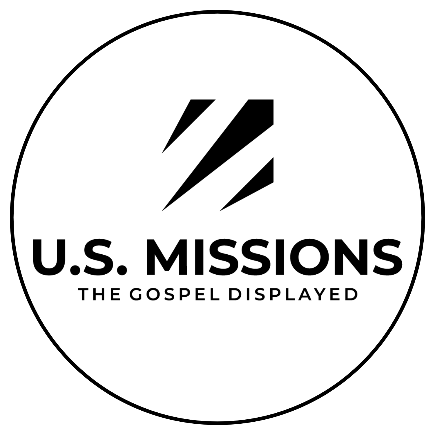 A circular logo featuring three lightning bolt symbols above the text 'U.S. Missions' and the tagline 'The Gospel Displayed'.