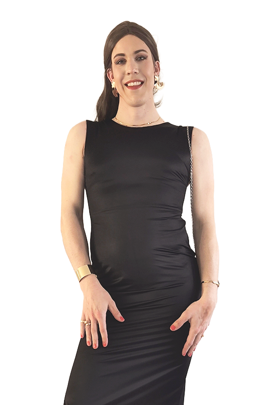 Lauren wearing a fitted black sleeveless dress, gold jewelry, and smiling at the camera.