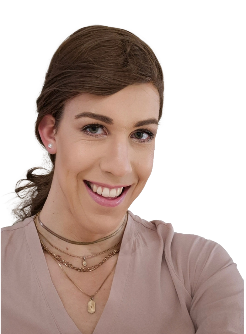 Lauren van Essen with brown hair styled in a loose braid, smiling and wearing pearl earrings, layered necklaces, and a beige top.