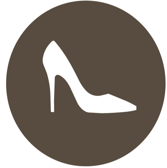 Silhouette of a high-heeled shoe on a brown circular background.