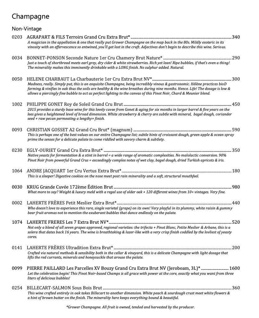 A wine menu listing various champagnes and sparkling wines with descriptions and prices.