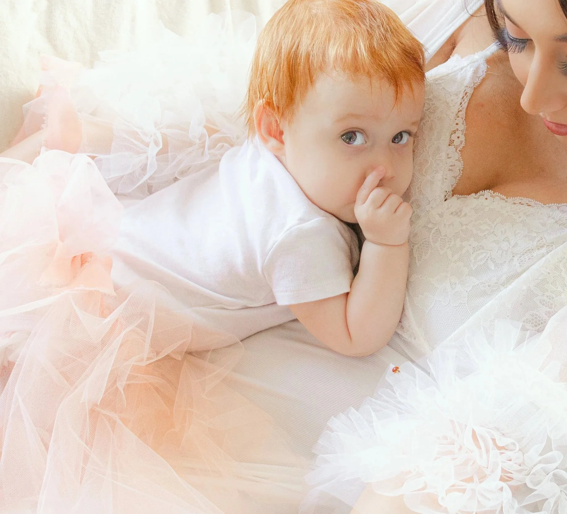 mom poses with baby for maternity photography chicago
