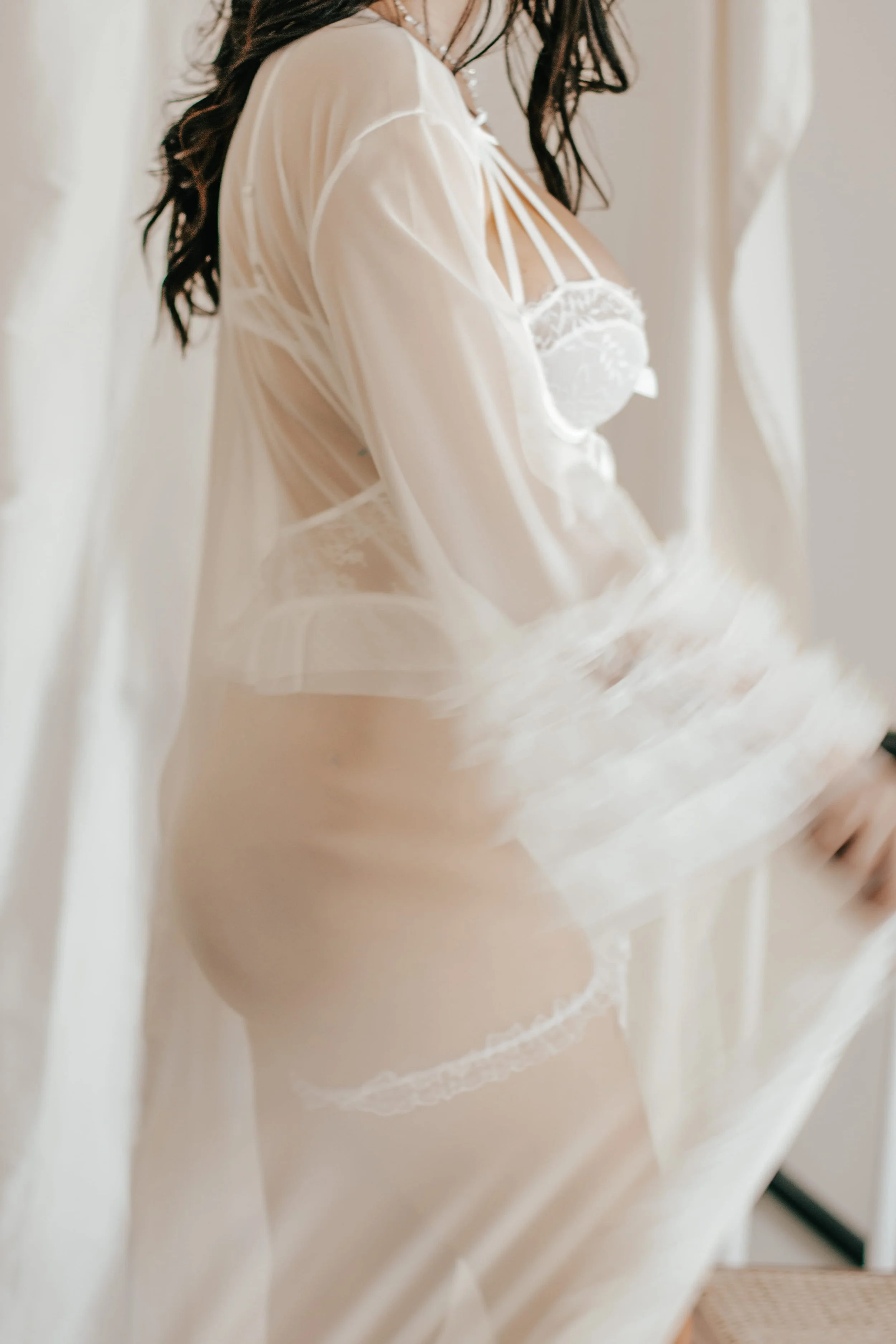 chicago bride posing in bridal boudoir robe