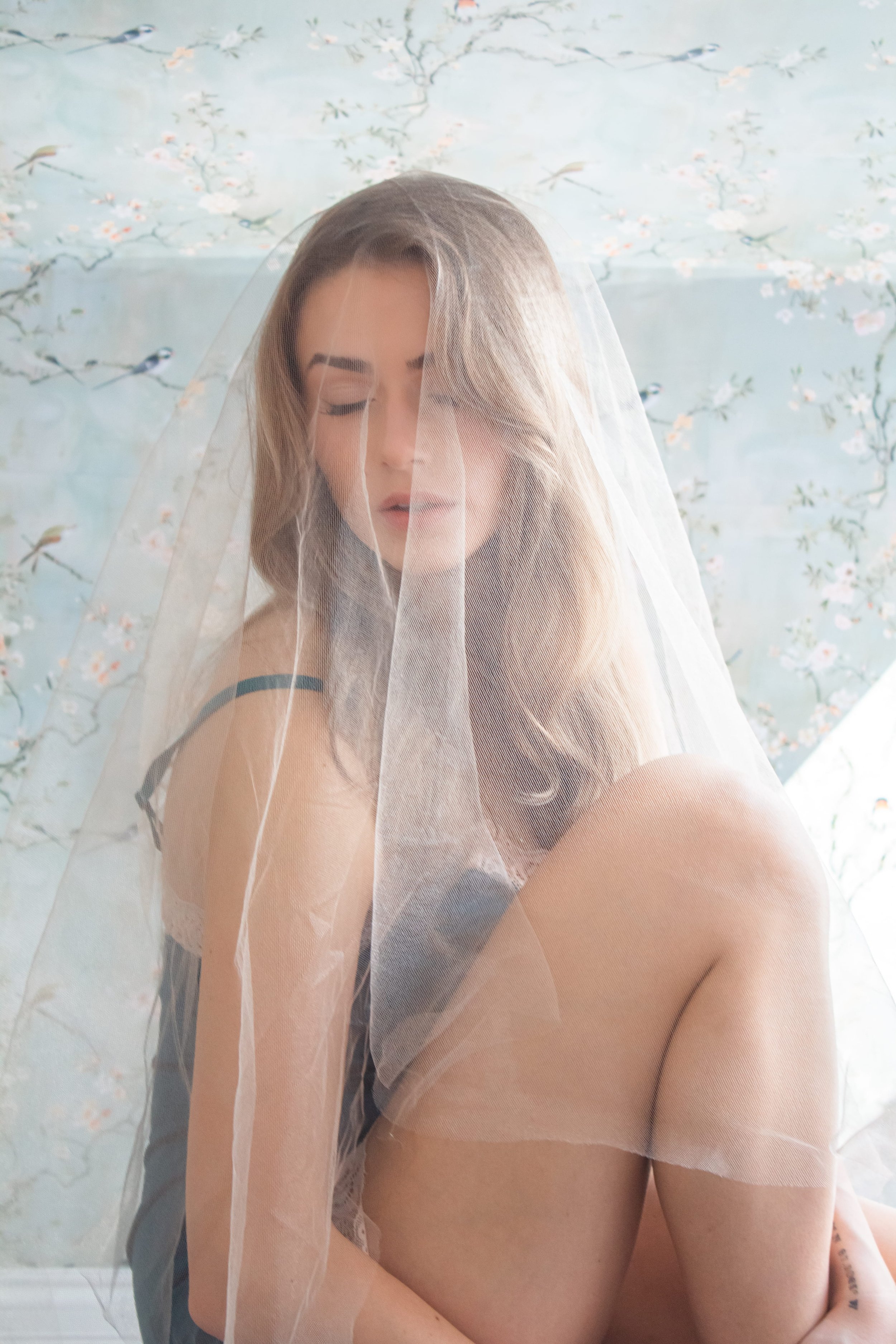 woman poses in for wedding boudoir in chicagoland