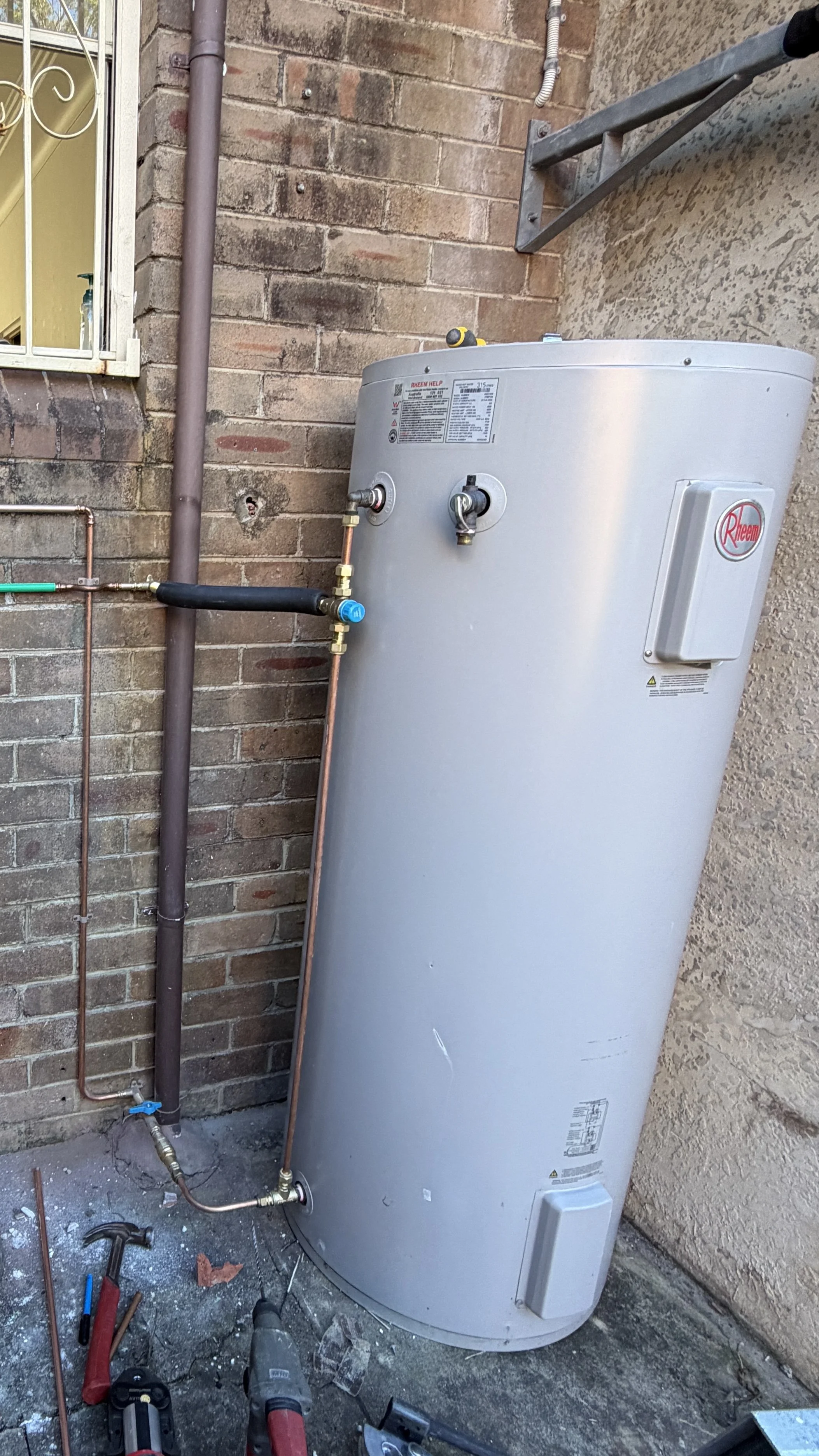 Hot Water System Repair and Relocation
