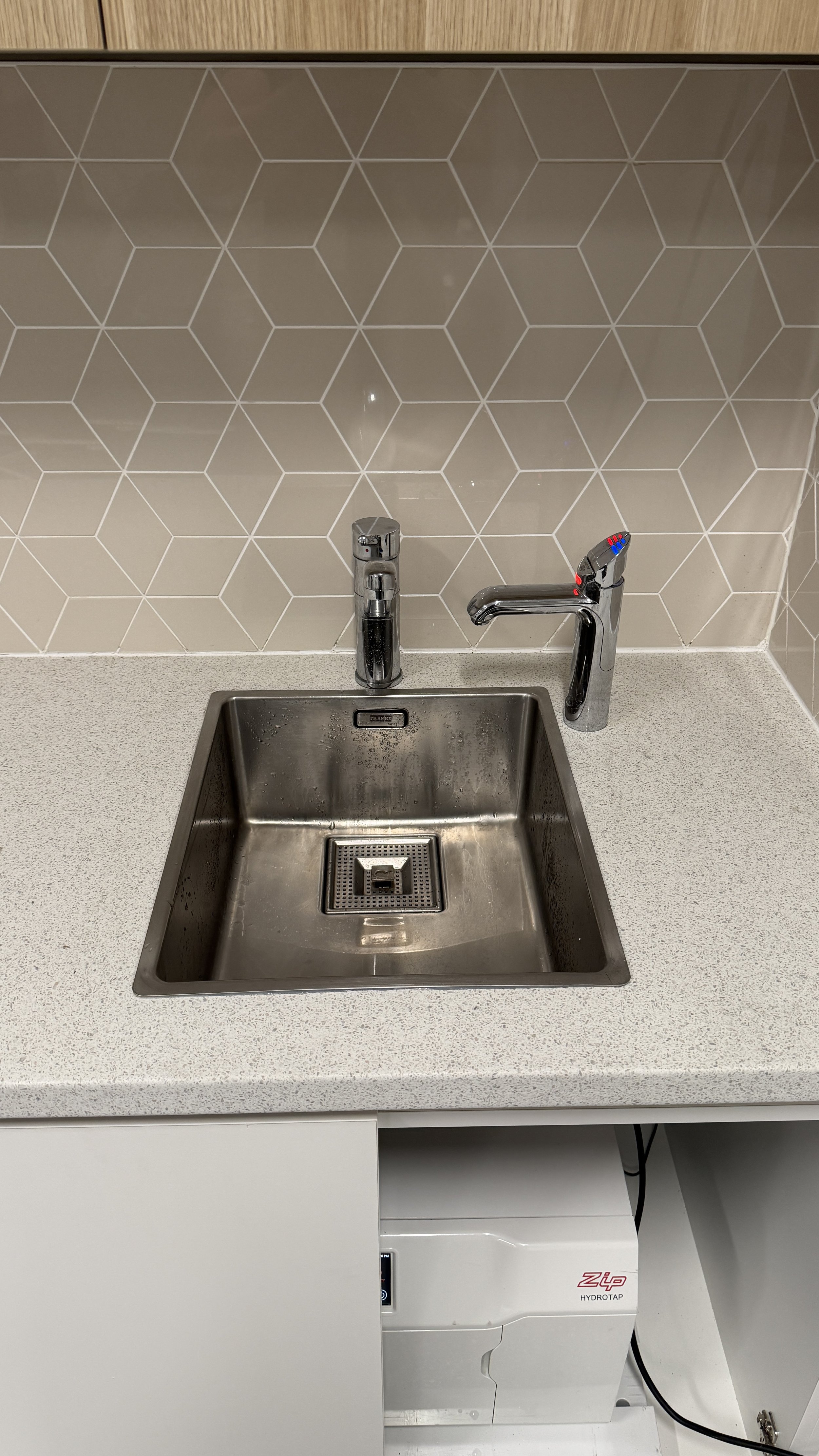 Commercial Plumbing Installation with Zip Hot water unit