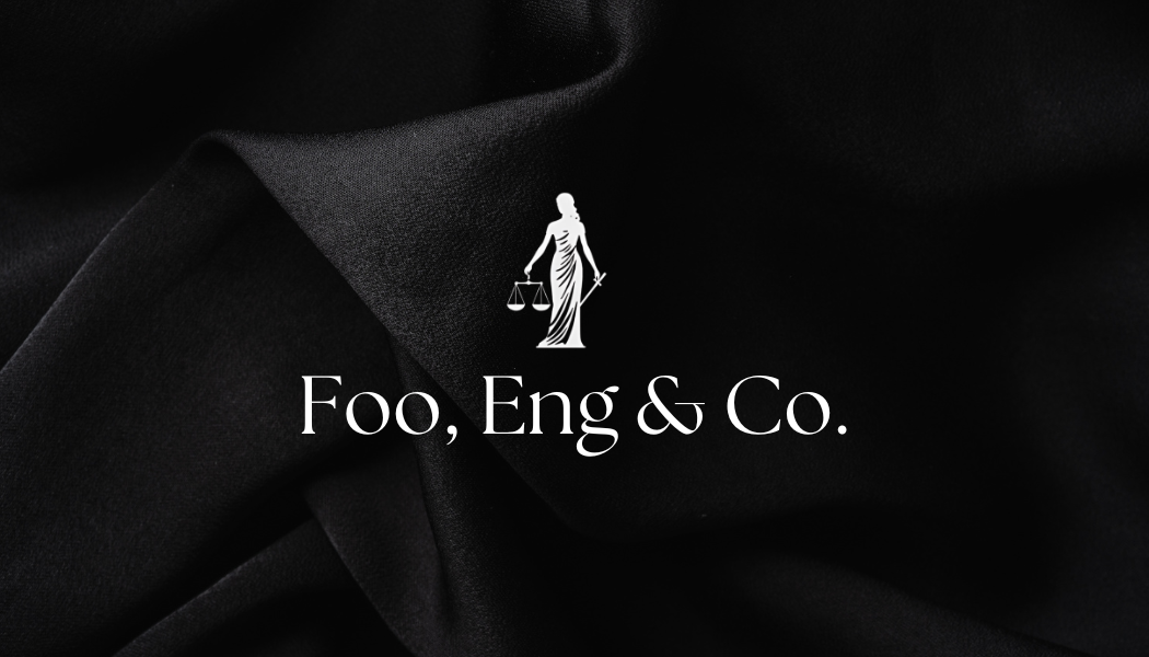 A black background with a white logo of Lady Justice holding scales and a sword, and the text "Foo, Eng & Co." in white.