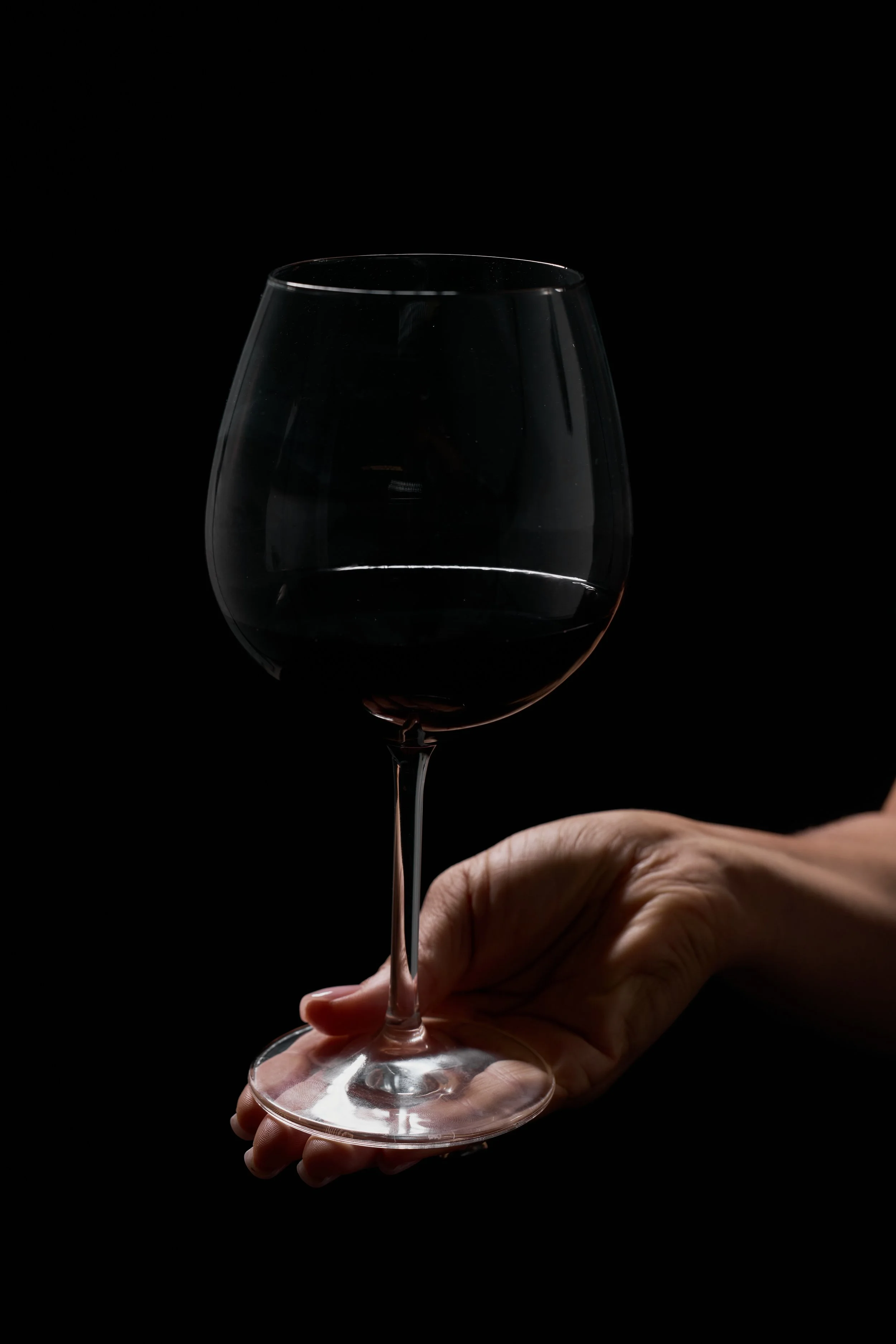 French wine glass filled with Burgundy.