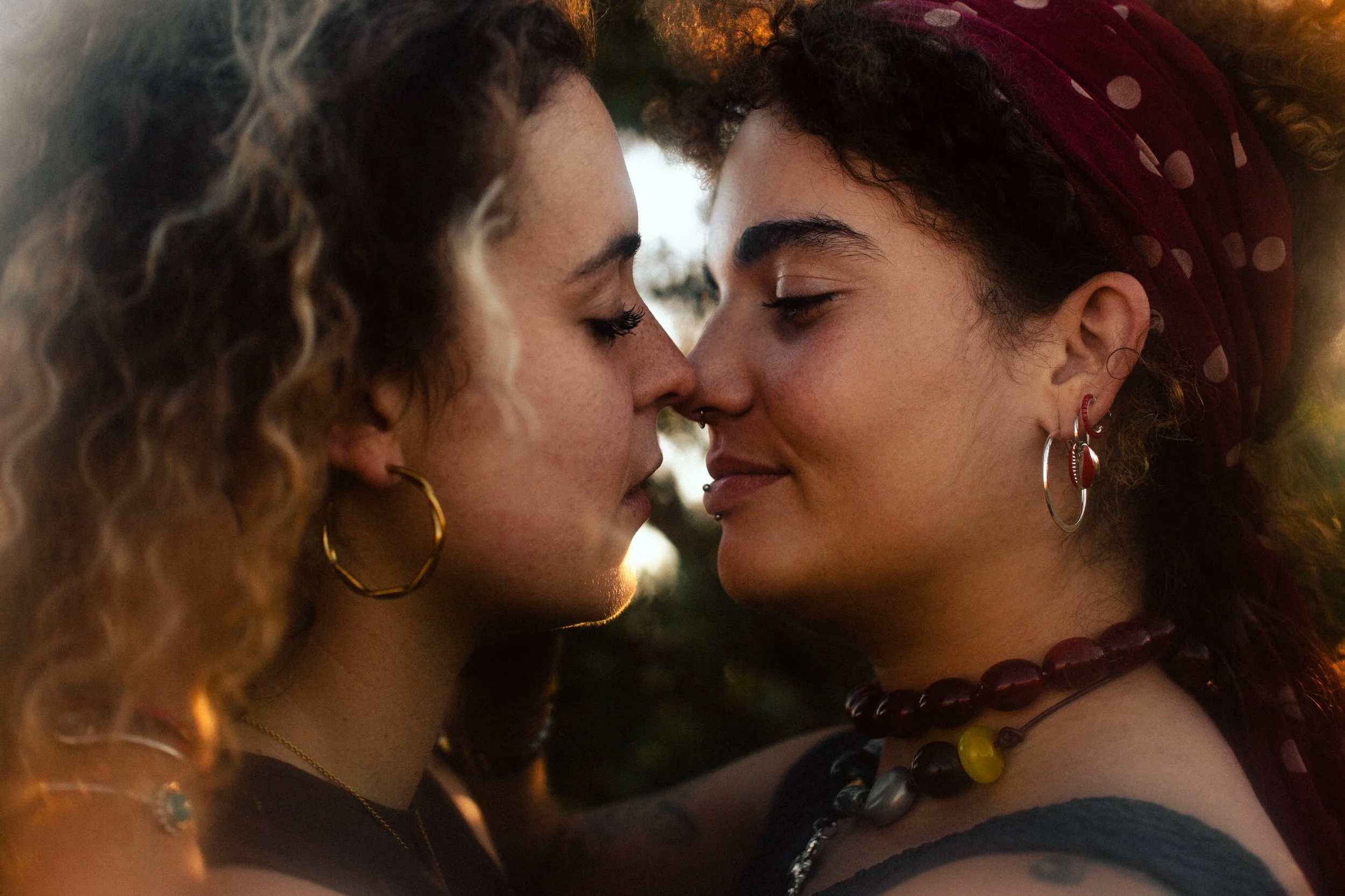 Two women touching foreheads at golden hour — couples portrait session in Barcelona by Whip & Honey
