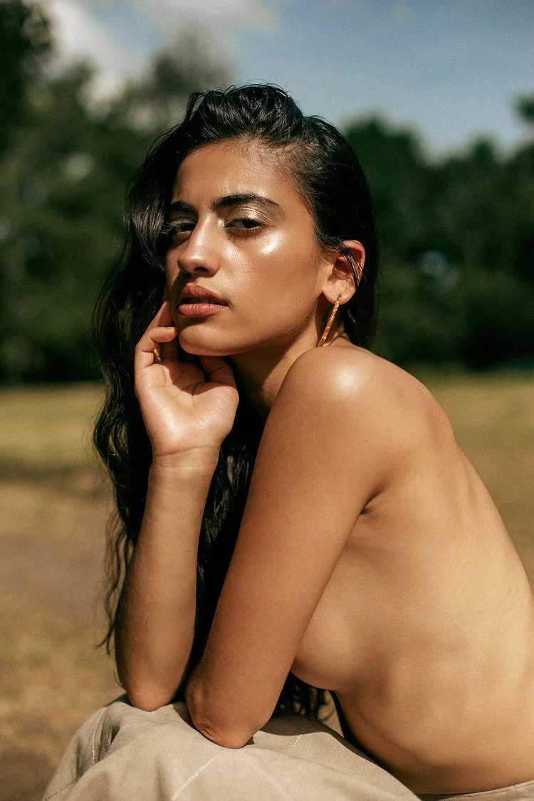 Individual portrait of a young woman sitting outdoors in Barcelona sunlight — Whip & Honey photographer
