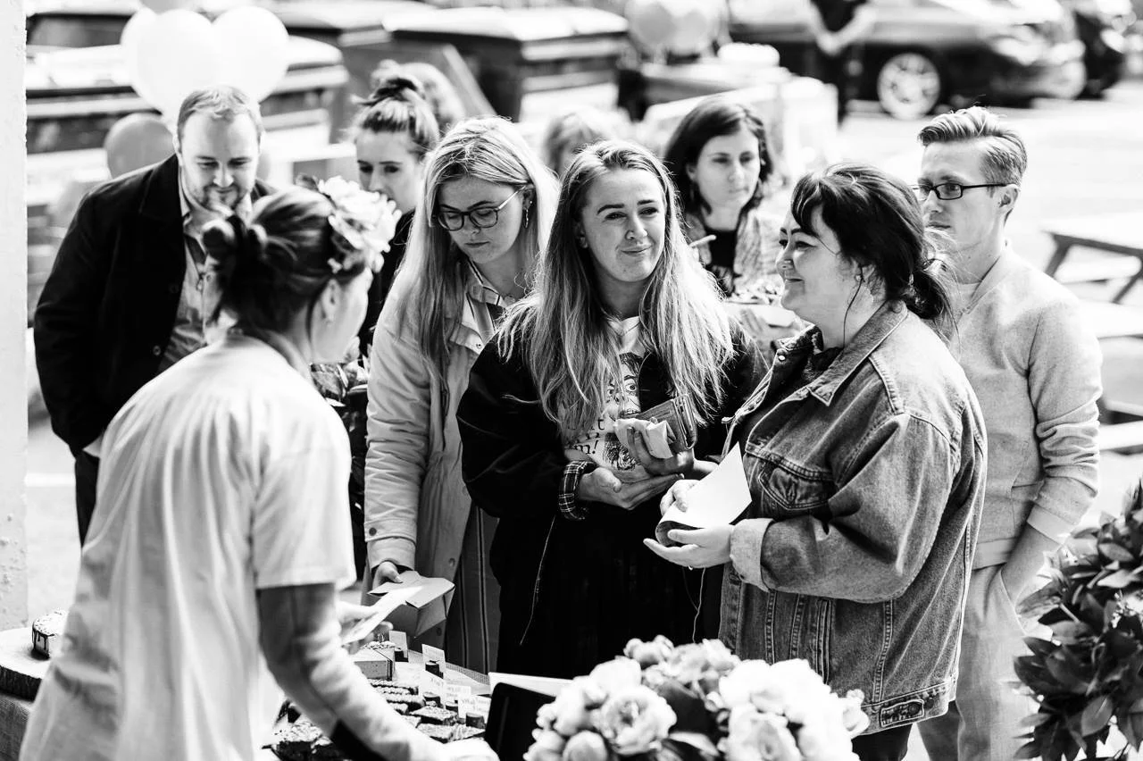 Corporate catering guests networking at an outdoor company event
