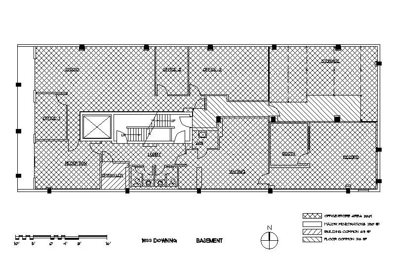 Blueprint floor plan of a building's basement with various rooms labeled, including offices, a store kitchen, a service corridor, meeting room, and staircases, with hatch markings indicating different area zones.