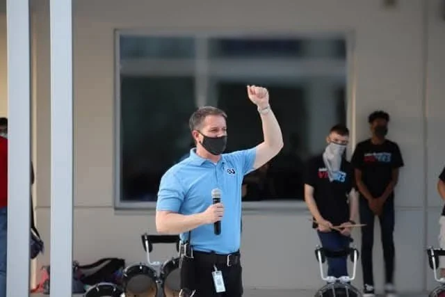 Guy Swenson founding principal of Lake Buena Vista High School addressing students during the return to school amid the COVID-19 pandemic in 2021 in Orlando Florida