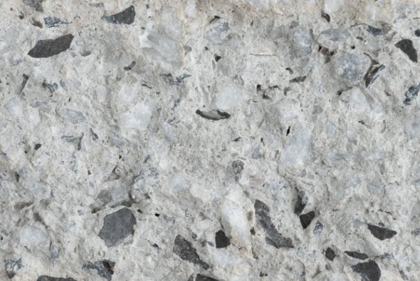 Close-up of a gray, speckled granite surface.