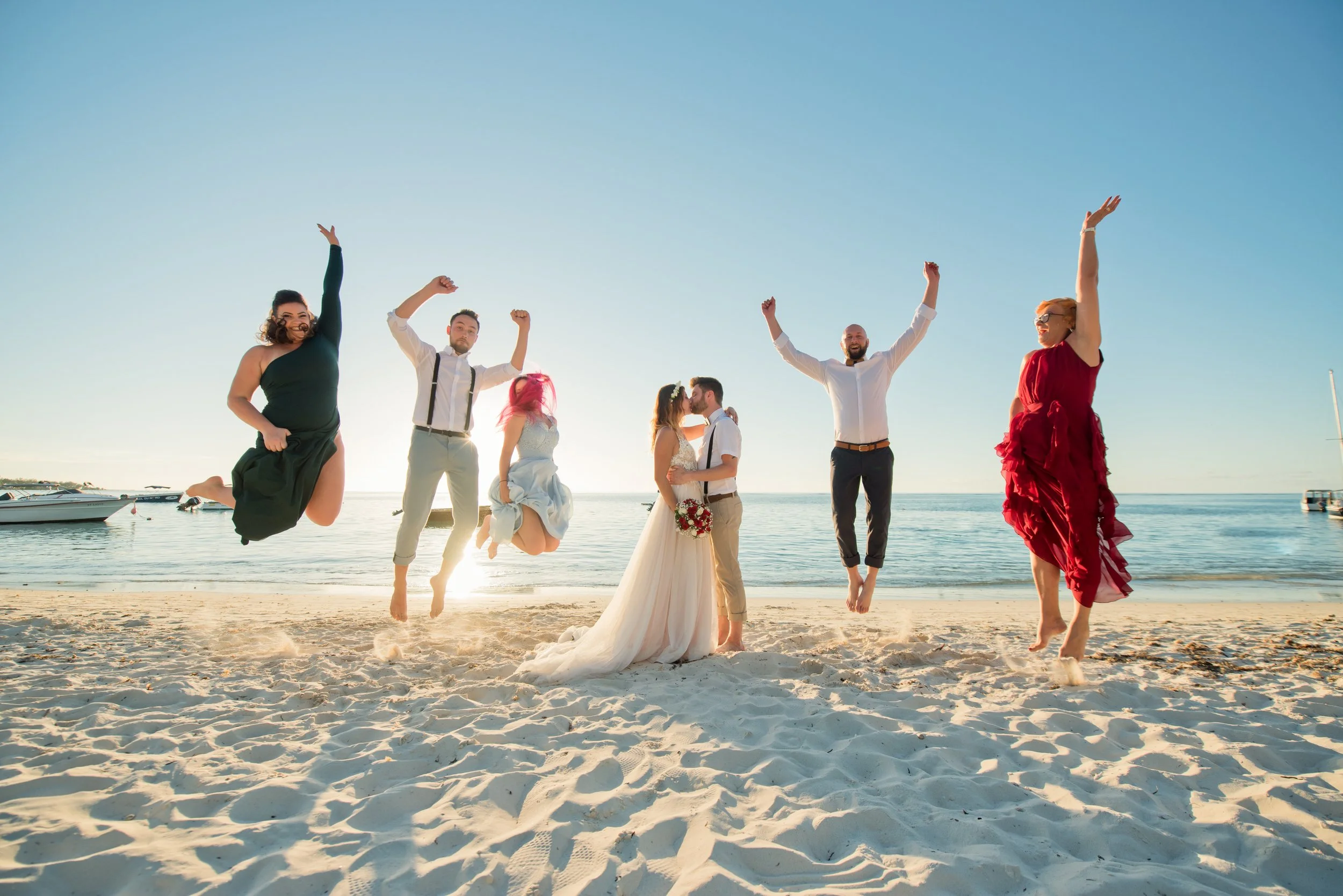 mauritius-beach-wedding-photographer-bride-groom-group-photot-jumping.jpg