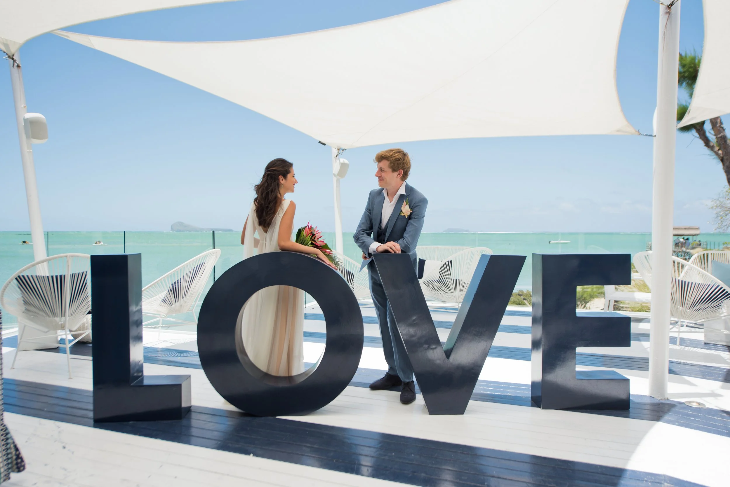 mauritius-beach-wedding-photographer-bride-groom-jetty-lux-hotel.jpg