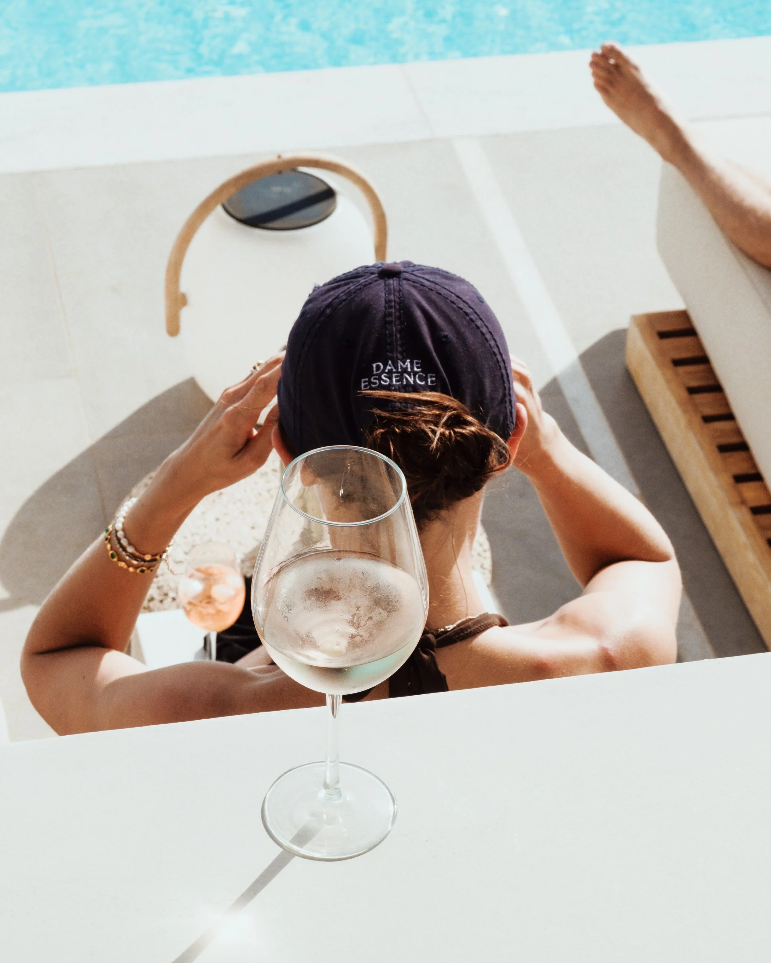 Staying hydrated poolside 🧢🩵💦 #dameessence