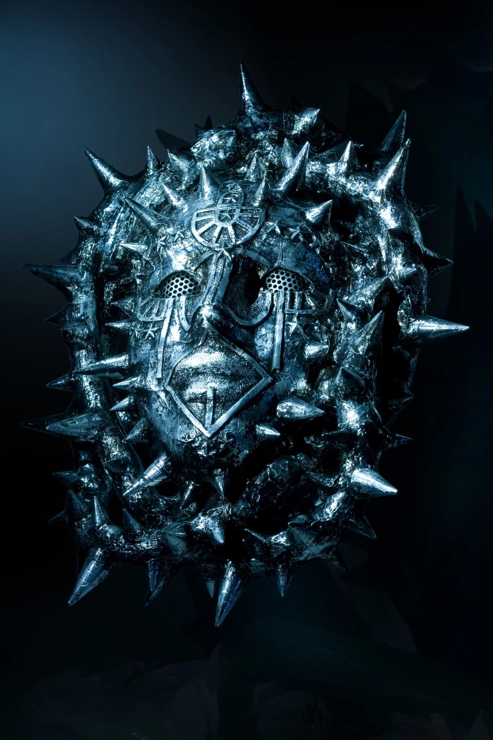 Mask of the Star Eater, 2015. wood/aluminum/mixed media, 24 × 16× 12 in.