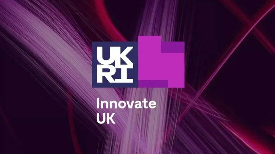 Logo and branding for UKRI with the text "Innovate UK" on a background of purple and pink abstract light streaks.