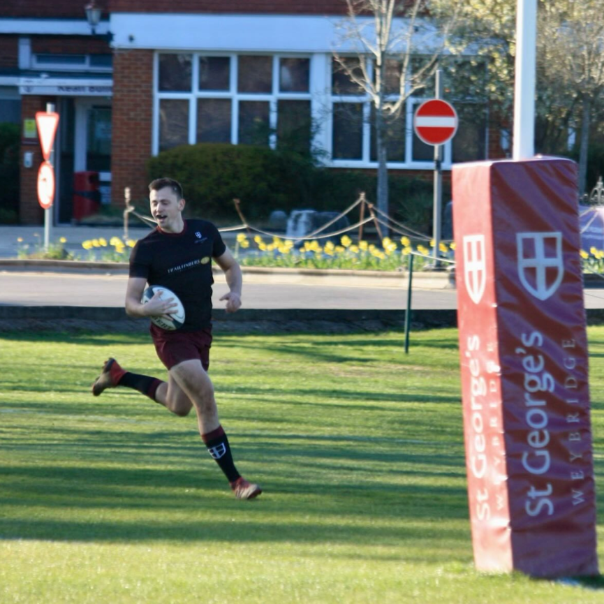 OGRFC player runs under the posts to score a try for Old Georgian's RFC 1st XV at St George's College, Weybridge