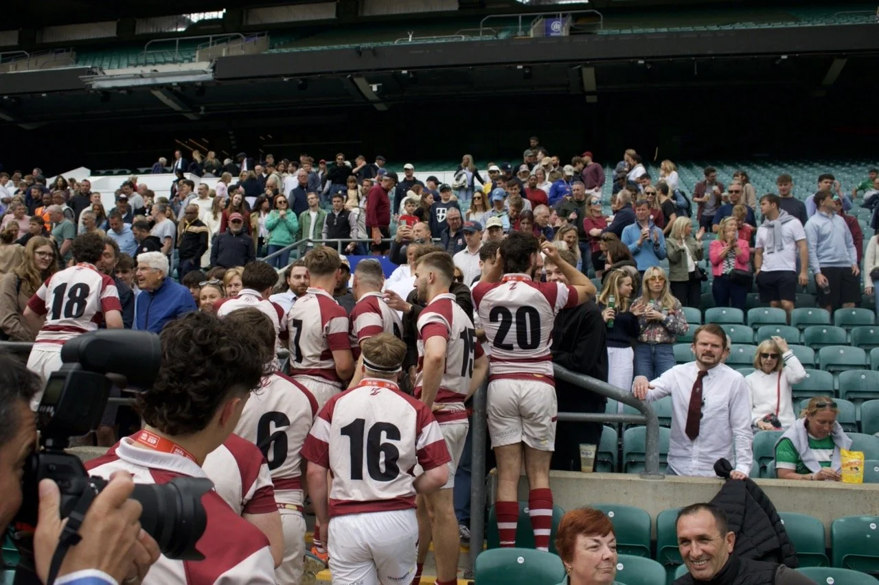 Players of Old Georgian's mingle with their supporters in the stands of Allianz Stadium, Twickenham after the 2025 RFU Community Cup Final