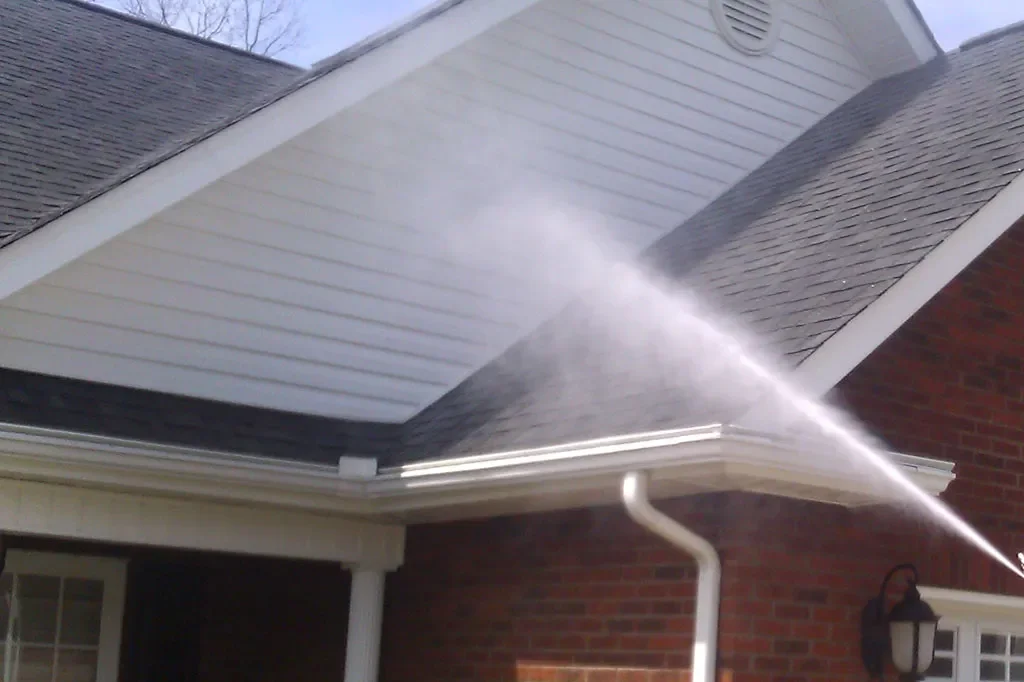 a house being softwashed