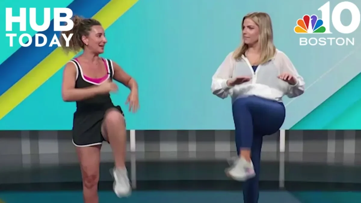 Two women demonstrate stretching exercises on a television set with a colorful background and the text 'HUB TODAY' and NBC 10 Boston logo.